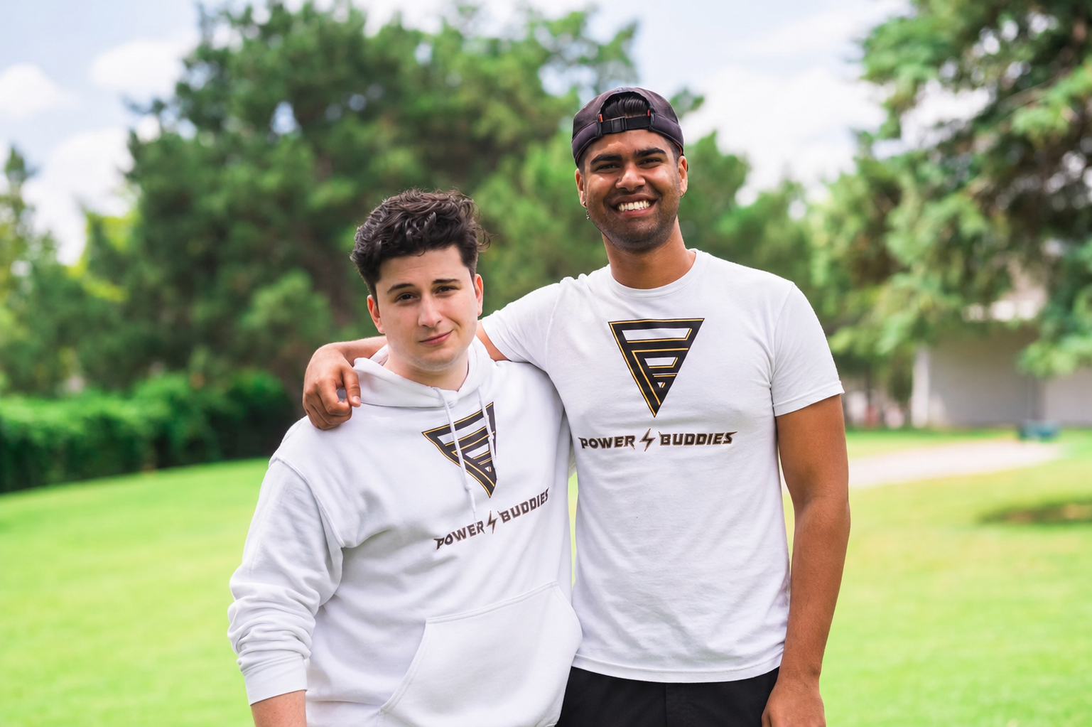 Power Buddies founders Petros Lazanis and Muhan Patel standing together outdoors