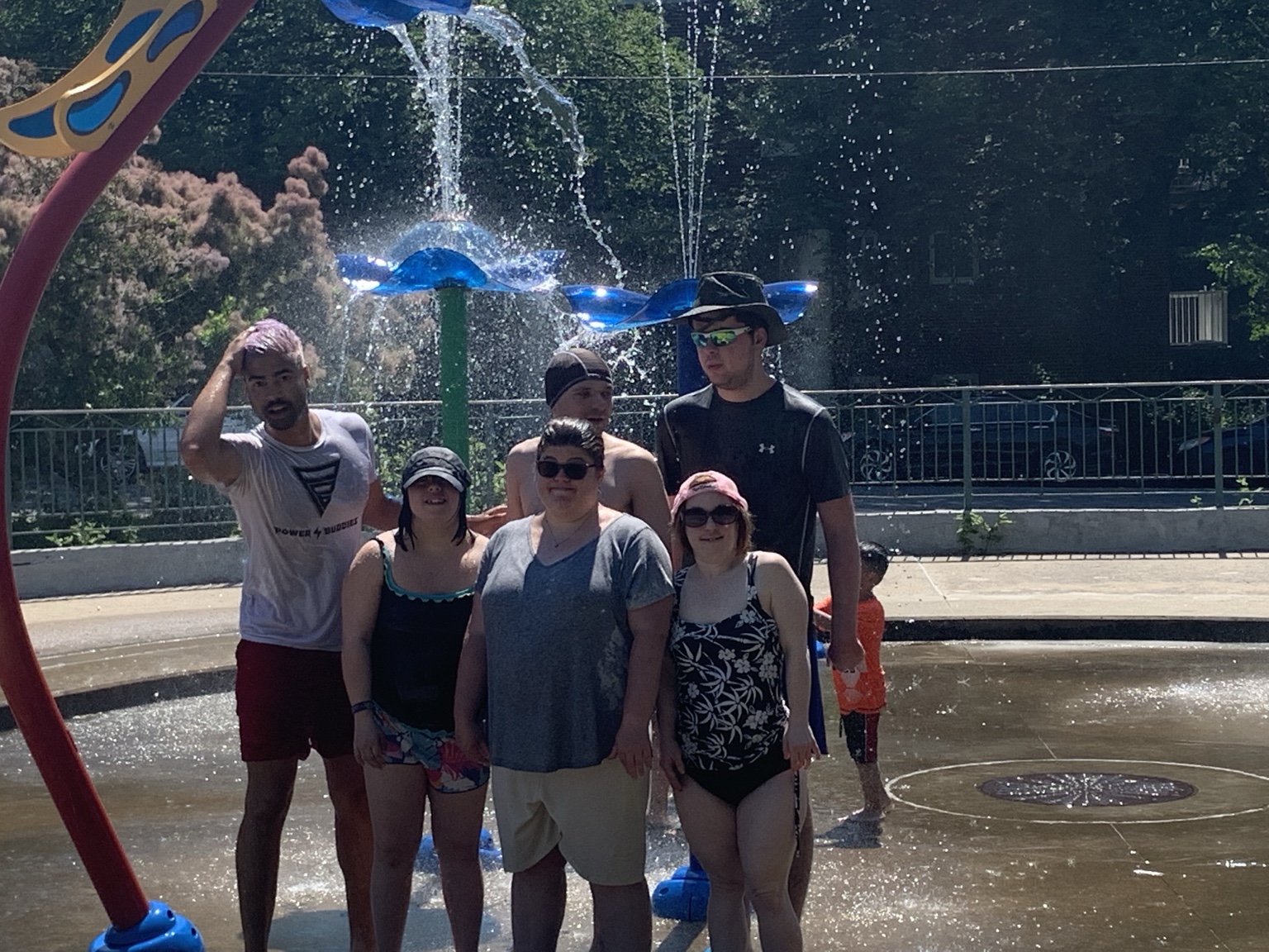 A group of buddies together at outdoor water games